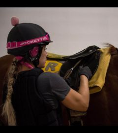 Saddling in the morning at Century Mile 2021