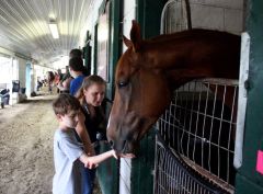 'Pender' greets young racing fans on a backstretch tour... (McCalmont Photo)