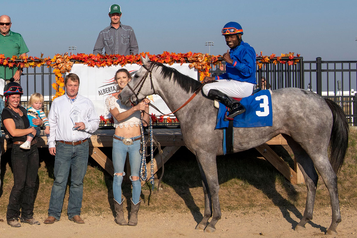 Stevie Wonder Girl in the winner's circle at the Alberta Oaks