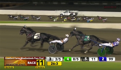 Control The Moment taking the lead in the backstretch of the Meadowlands Pace on July 16, 2016