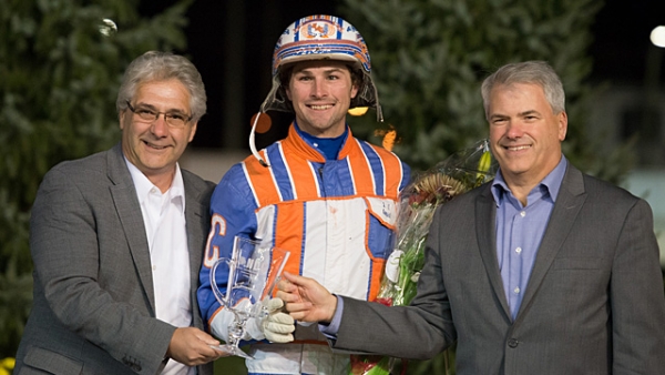 Dan Gall, President &amp; CEO of Standardbred Canada, and Mike Woods, Chief Operating Officer of Western Fair District, flank 2016 National Driving Champion Brandon Campbell (Western Fair District)