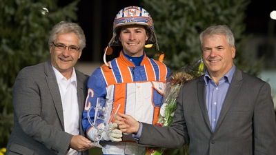 Dan Gall, President &amp; CEO of Standardbred Canada, and Mike Woods, Chief Operating Officer of Western Fair District, flank 2016 National Driving Champion Brandon Campbell (Western Fair District)