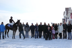 Lynn in the winners' circle at Century Downs in Calgary with Surging Star (Larry Munoz aboard, race 1) on November 4, 2017