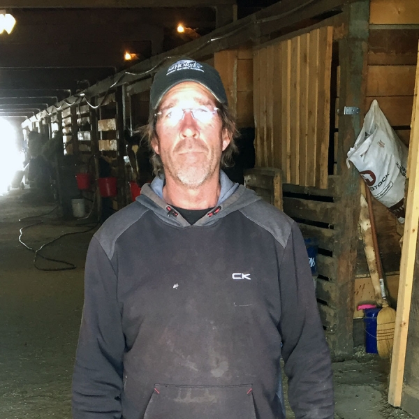 Groom Shawn McConaghie in the barns at RMTC